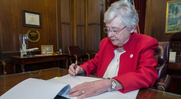 Alabama Gov. Kay Ivey Cites God As She Signs Nation’s Most Restrictive Abortion Law