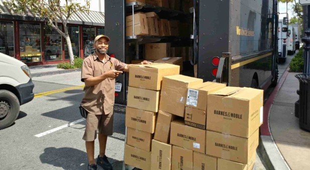 Caylin Louis Moore's Uncle LaMarr Moore delivers books.