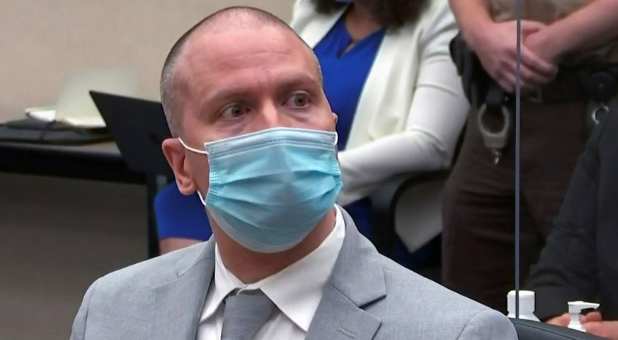 Former Minneapolis police officer Derek Chauvin reacts as he listens to the judge announce his sentence of twenty two and a half years in prison for the murder of George Floyd during his sentencing hearing in Minneapolis, Minnesota, U.S. June 25, 2021 in a still image from video. Pool via REUTERS