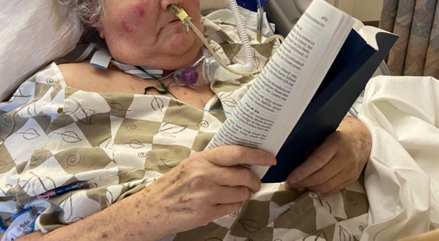 Bettina Lerman holds a Bible during a family visit.