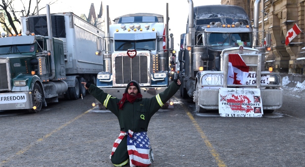 A supporter during the 4th Day of Trucker's protest against the mandatory vaccine policy imposed on the Canadian truckers returning from USA to avoid a two week quarantine at Parliament Hill in Ottawa-Canada