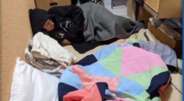 Orphan Hands worker sleeping on cement floor at the Ukraine border