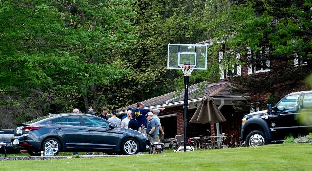 May 15, 2022; Conklin, NY, USA; New York State Police gather to investigate the home of Payton Gendron on Amber Hill Road in Conklin, N.Y. on Sunday, May 15, 2022. Payton Gendron, 18, is the suspected gunman in Saturday s mass shooting in Buffalo, resided on Amber Hill Road.