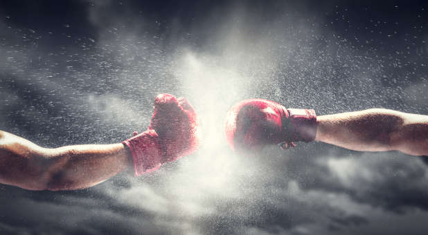 Boxing gloves in a fight.