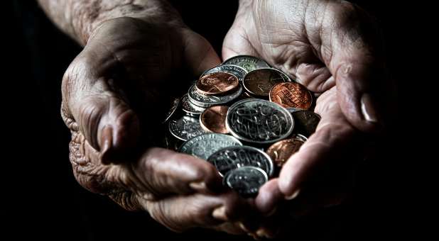 open hands holding coins