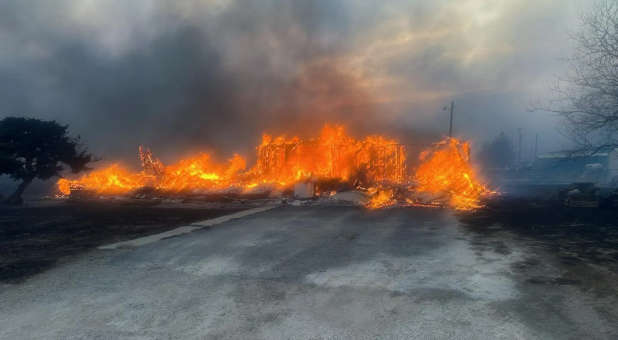 A fire destroying a building in Texas.